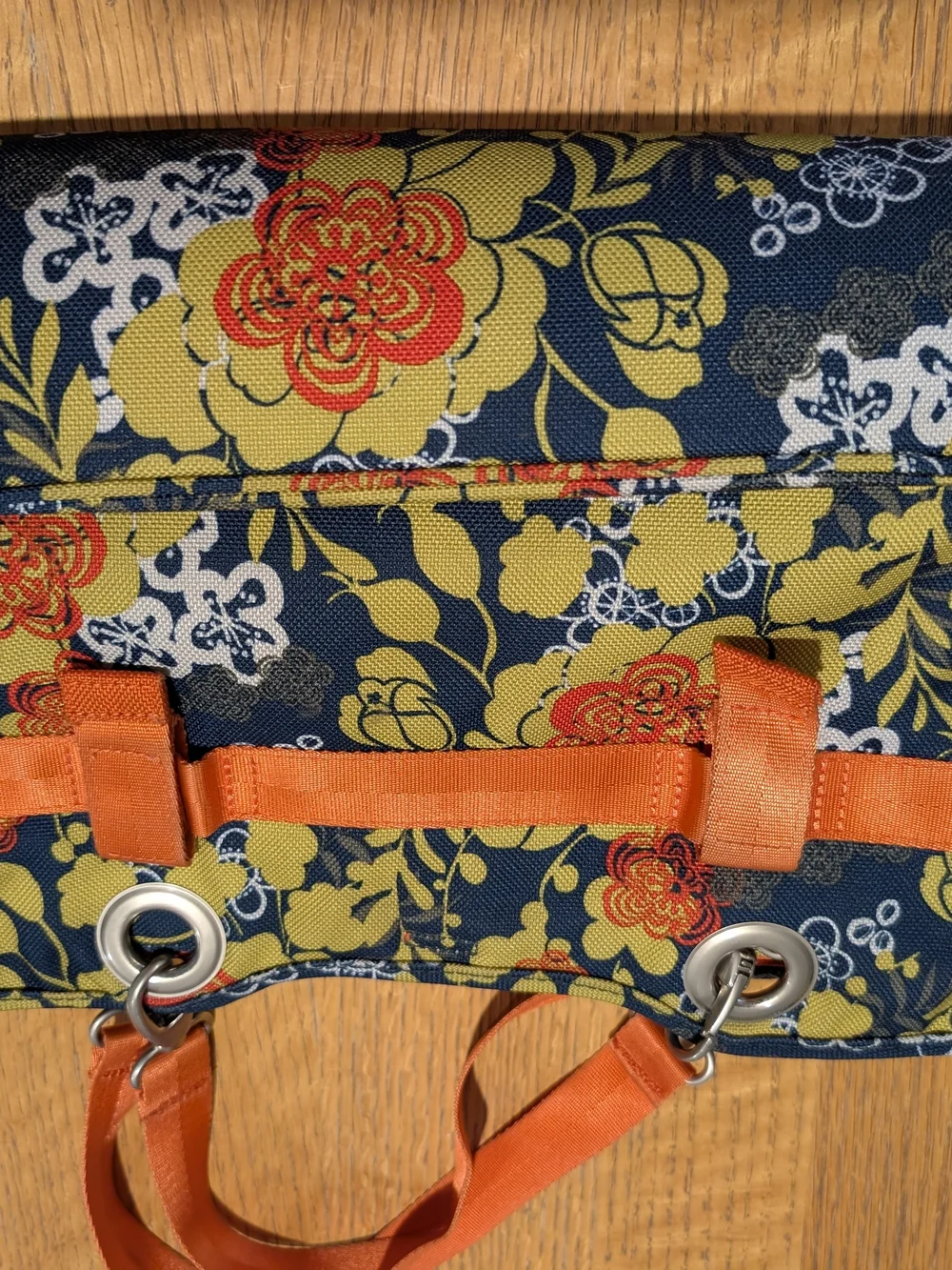 Haiku Navy Floral Sachel with Orange Embroidery and Orange Handles